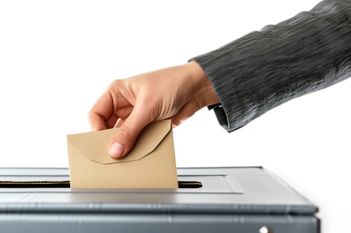 Hand putting an envelope into a ballot box by Midjourney