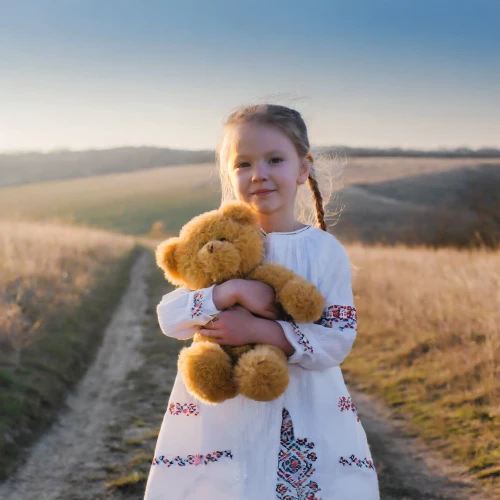 Girl holding a teddy bear by Adobe Firefly